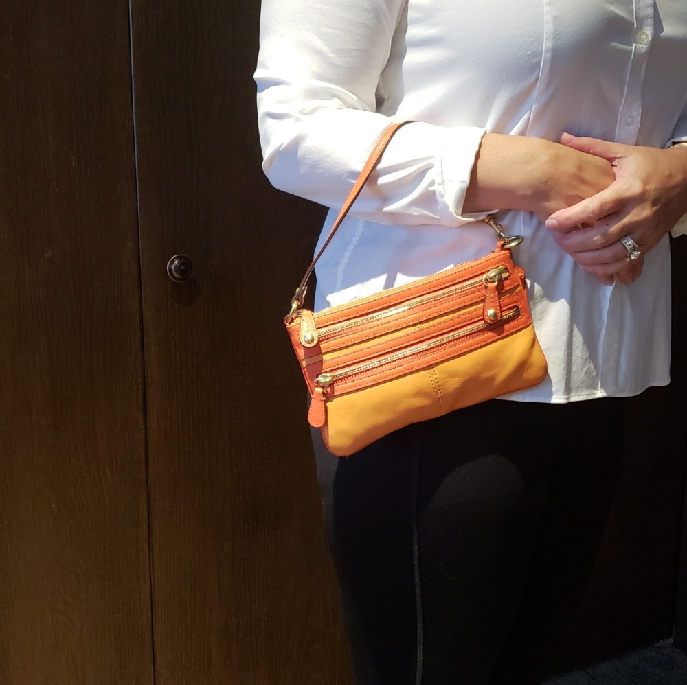 CoachTwo Tone Orange Wristlet